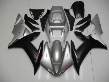 R1 02-03 - Plata Negro